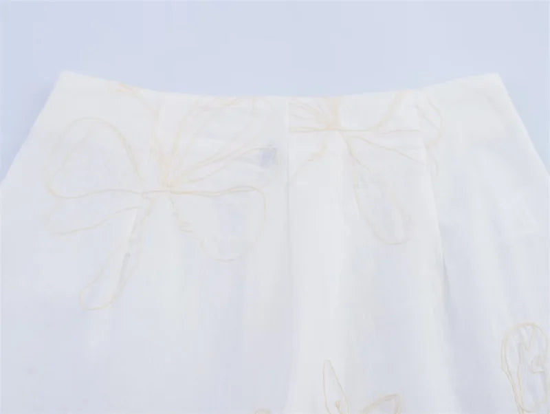 Women's suit New Summer 2025 White Camisole Wide-leg Pants Set Embroidered Trim Sexy Casual Personality Fashion