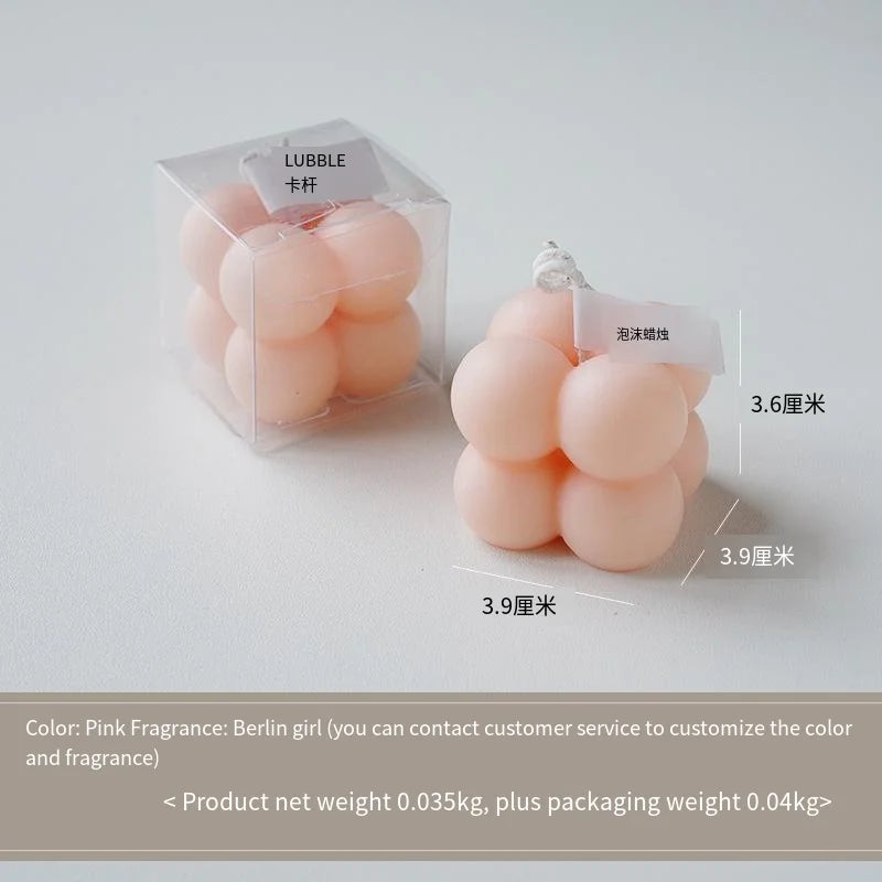 A square ball-shaped scented candle, a colorful birthday gift, a handcrafted candle, and a cute-shaped scented candle