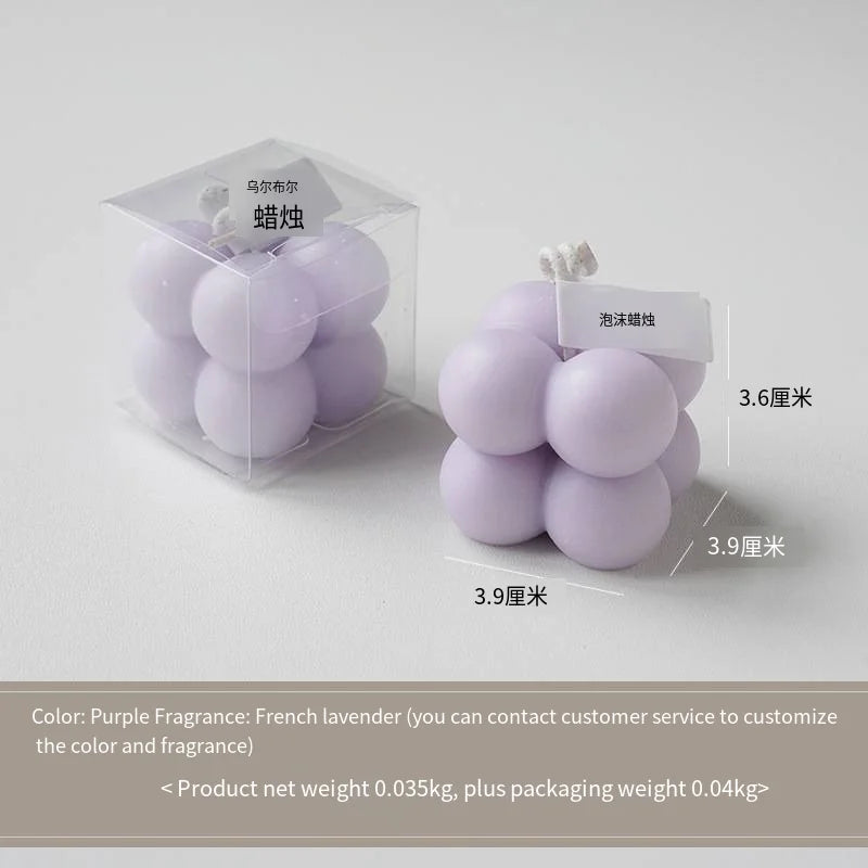 A square ball-shaped scented candle, a colorful birthday gift, a handcrafted candle, and a cute-shaped scented candle