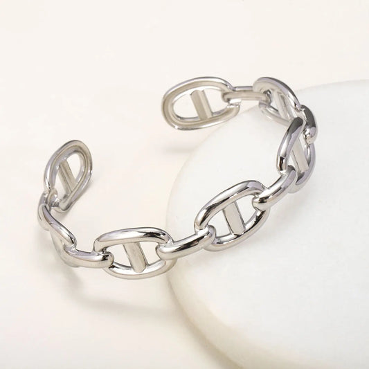 Titanium - Steel Gold - Plated C - Shaped Open - Ended Bangle. A Unique, Irregularly Spliced And Niche Accessory For Women.
