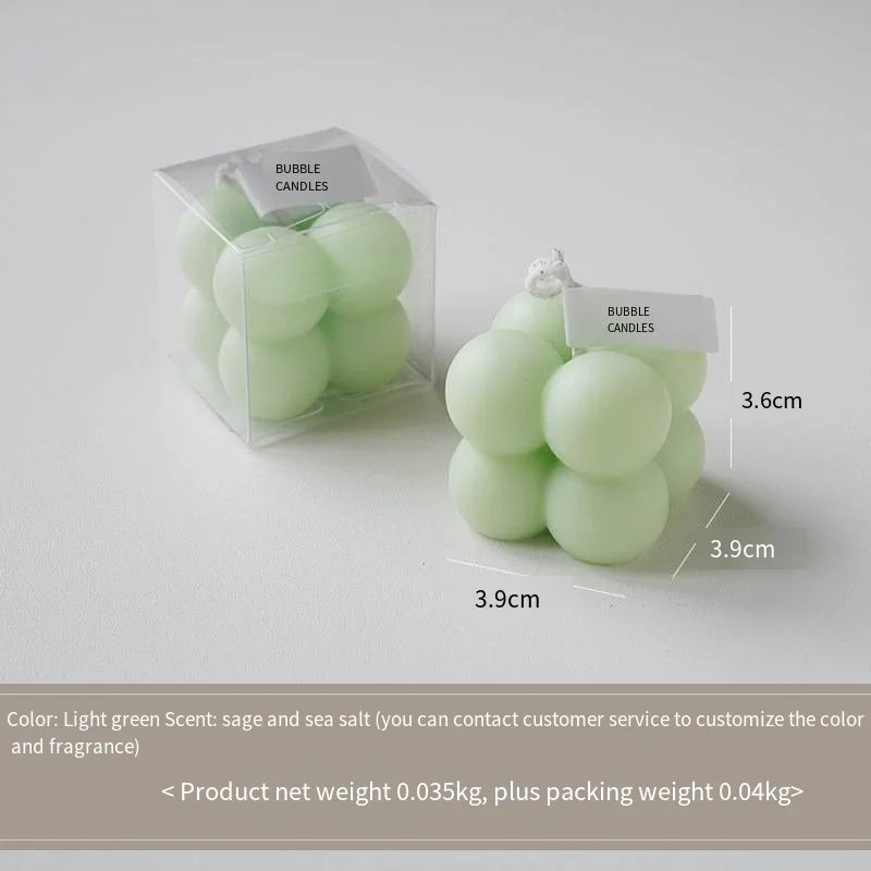 A square ball-shaped scented candle, a colorful birthday gift, a handcrafted candle, and a cute-shaped scented candle