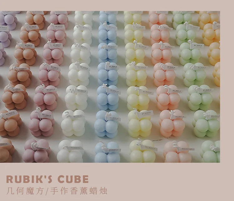 A square ball-shaped scented candle, a colorful birthday gift, a handcrafted candle, and a cute-shaped scented candle