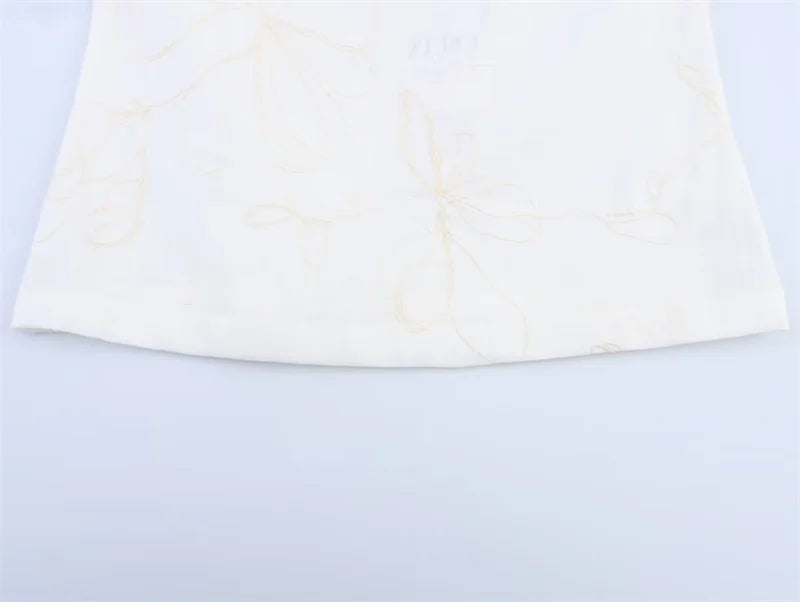 Women's suit New Summer 2025 White Camisole Wide-leg Pants Set Embroidered Trim Sexy Casual Personality Fashion